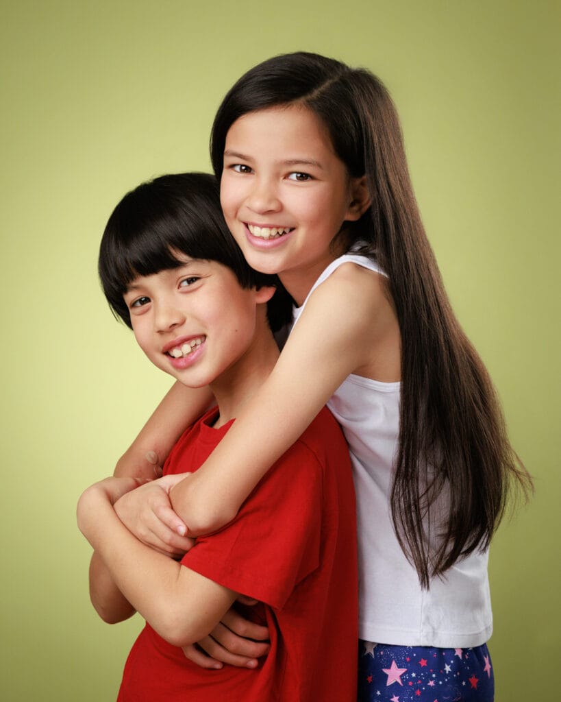 child siblings headshots