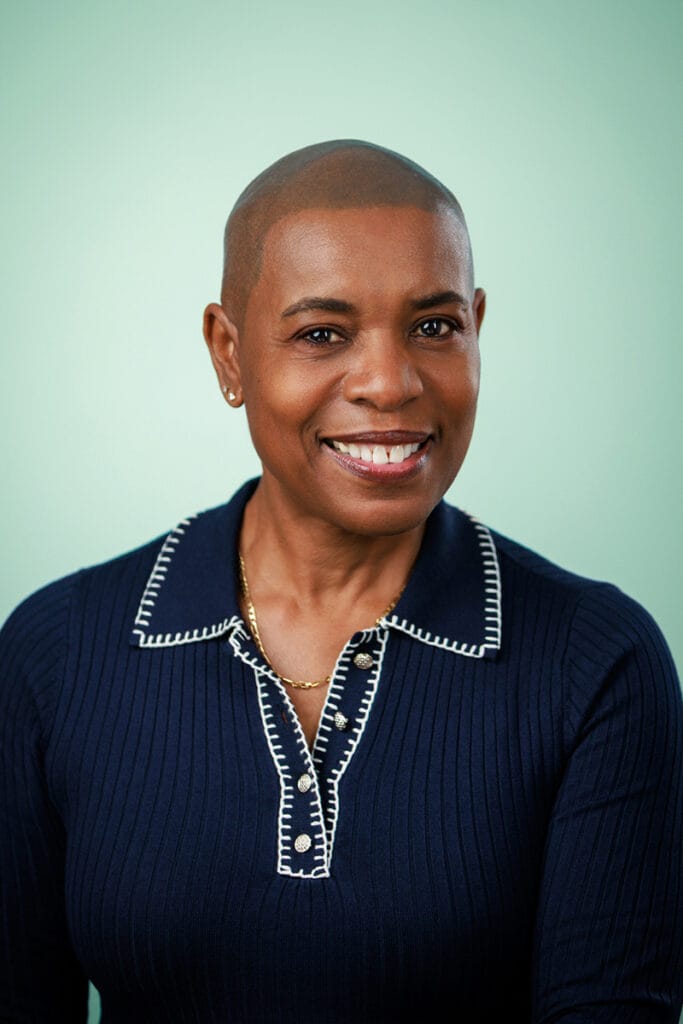 female headshot on light blue background